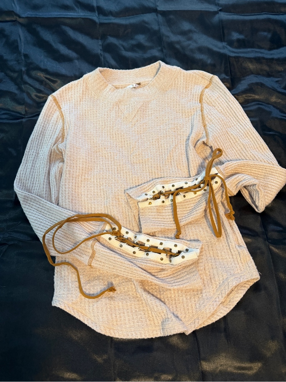 Free people top with lace up sleeves.